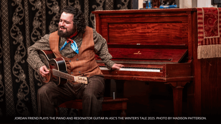 Jordan Friend performing live music on piano and resonator guitar during American Shakespeare Center’s production of The Winter’s Tale 2025 at the Blackfriars Playhouse in Staunton, Virginia.