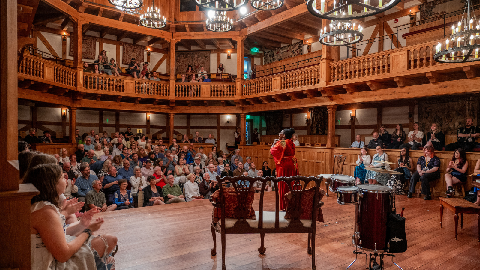 Raven Lorraine performs the Preshow Speech in THE WINTER'S TALE, 2025 on stage at the Blackfriars Playhouse in Staunton, VA. Photo by Madison Patterson.